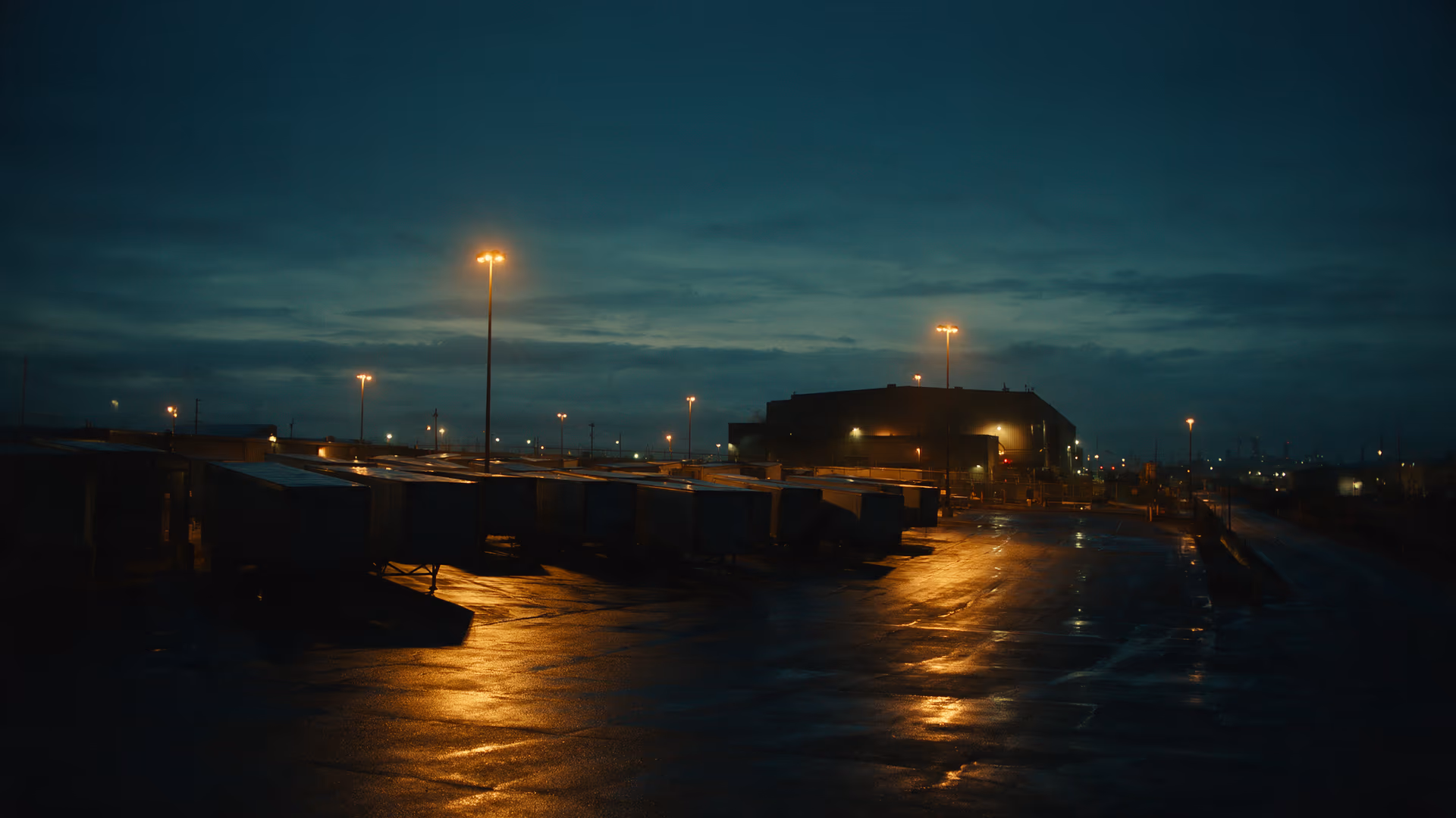 Freight yard at deep dusk