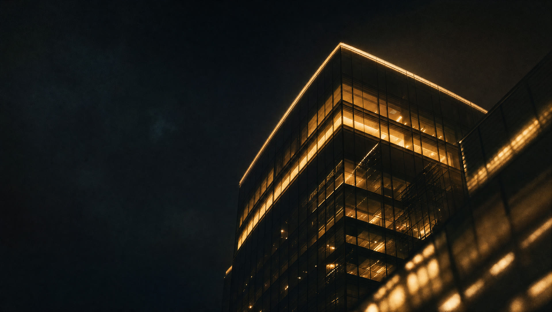 Financial tower glowing at night