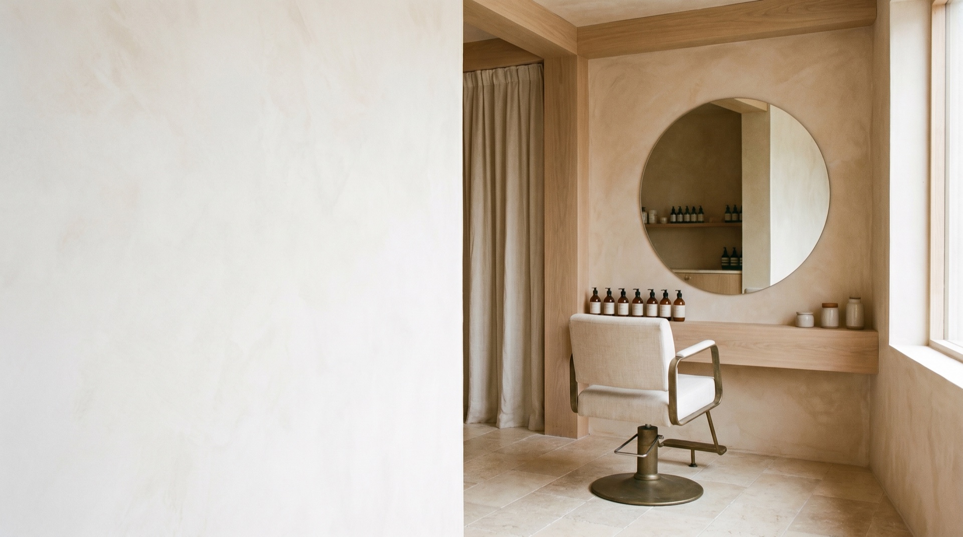 A bright, considered salon space in soft natural daylight