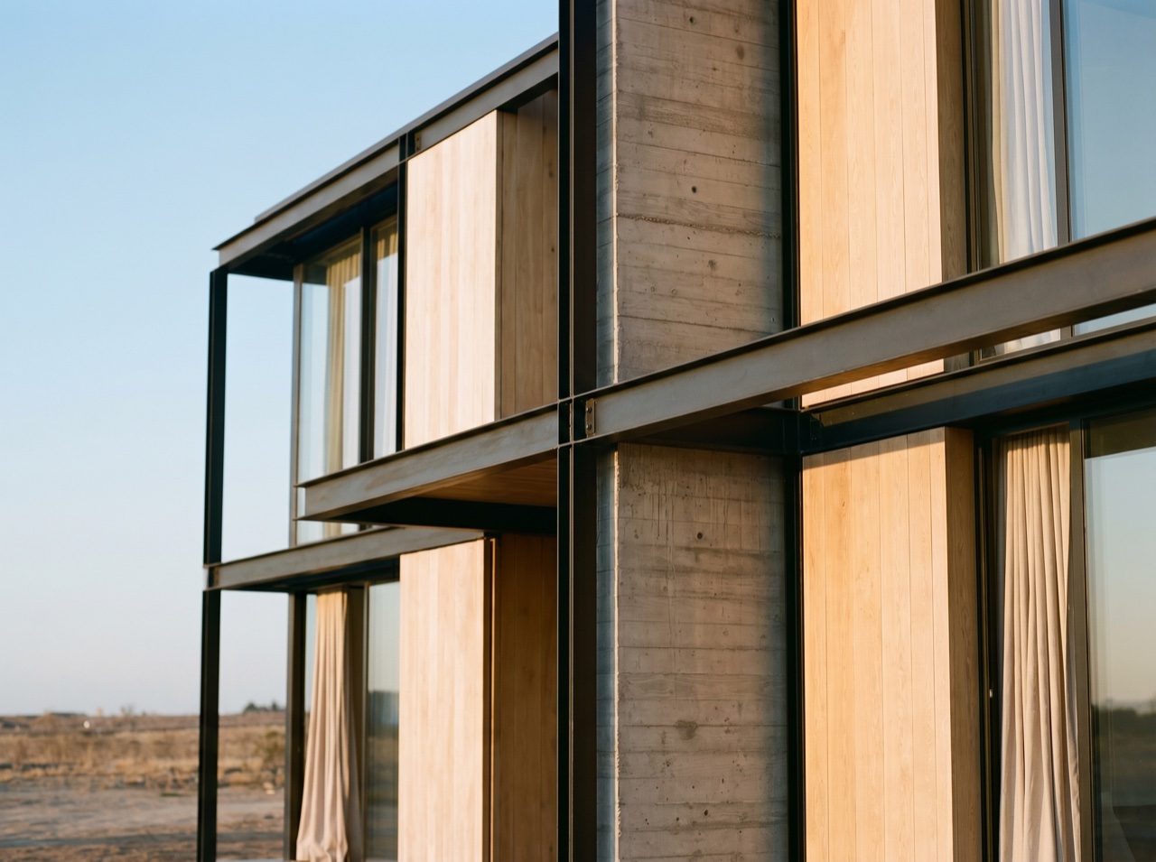 A finished structural frame against an open sky