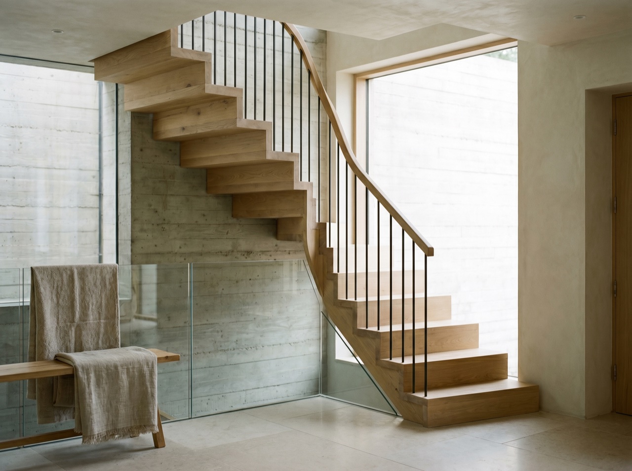 A bespoke timber staircase in soft daylight