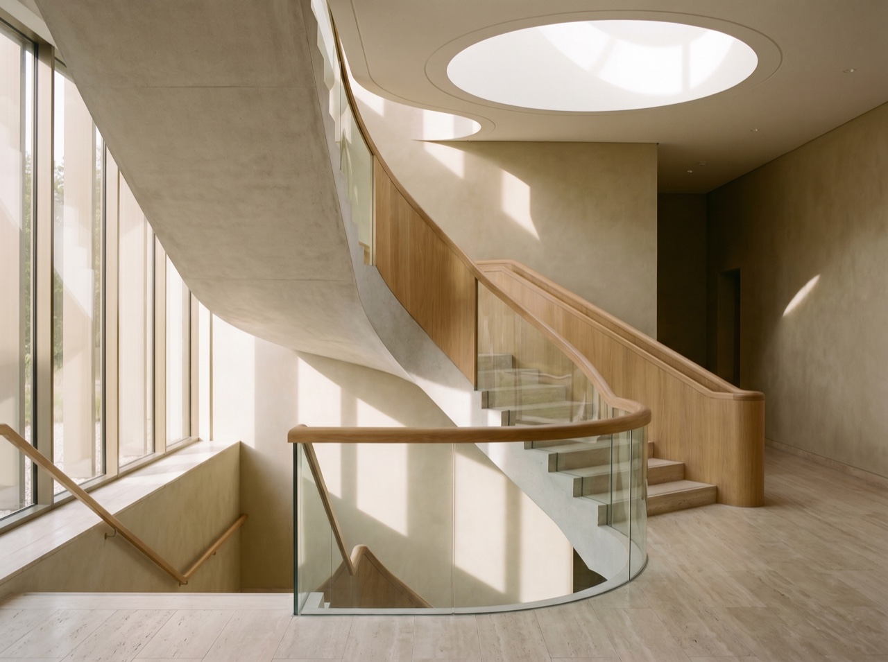 An architectural staircase and atrium in natural light