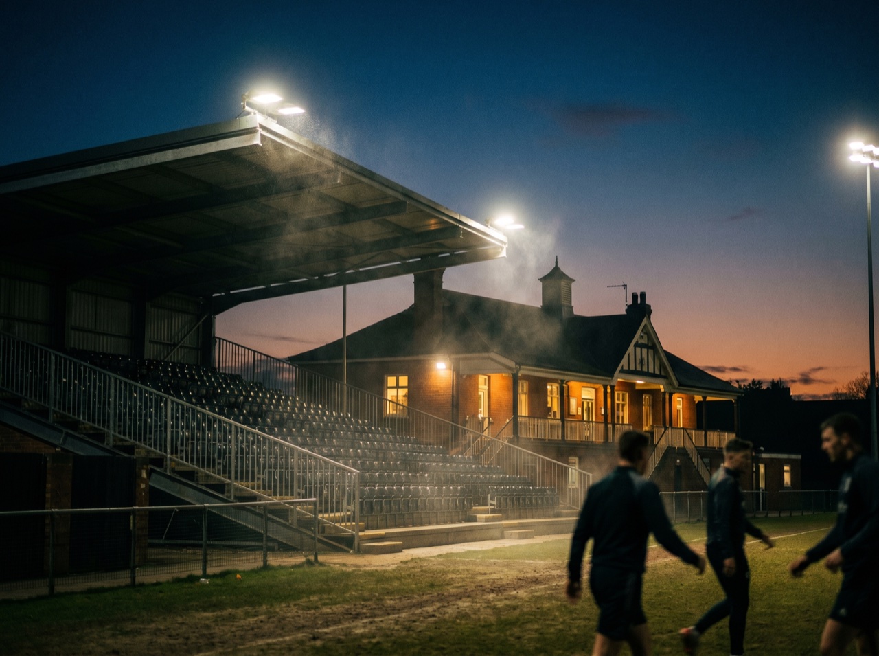 A floodlit clubhouse glowing on match night