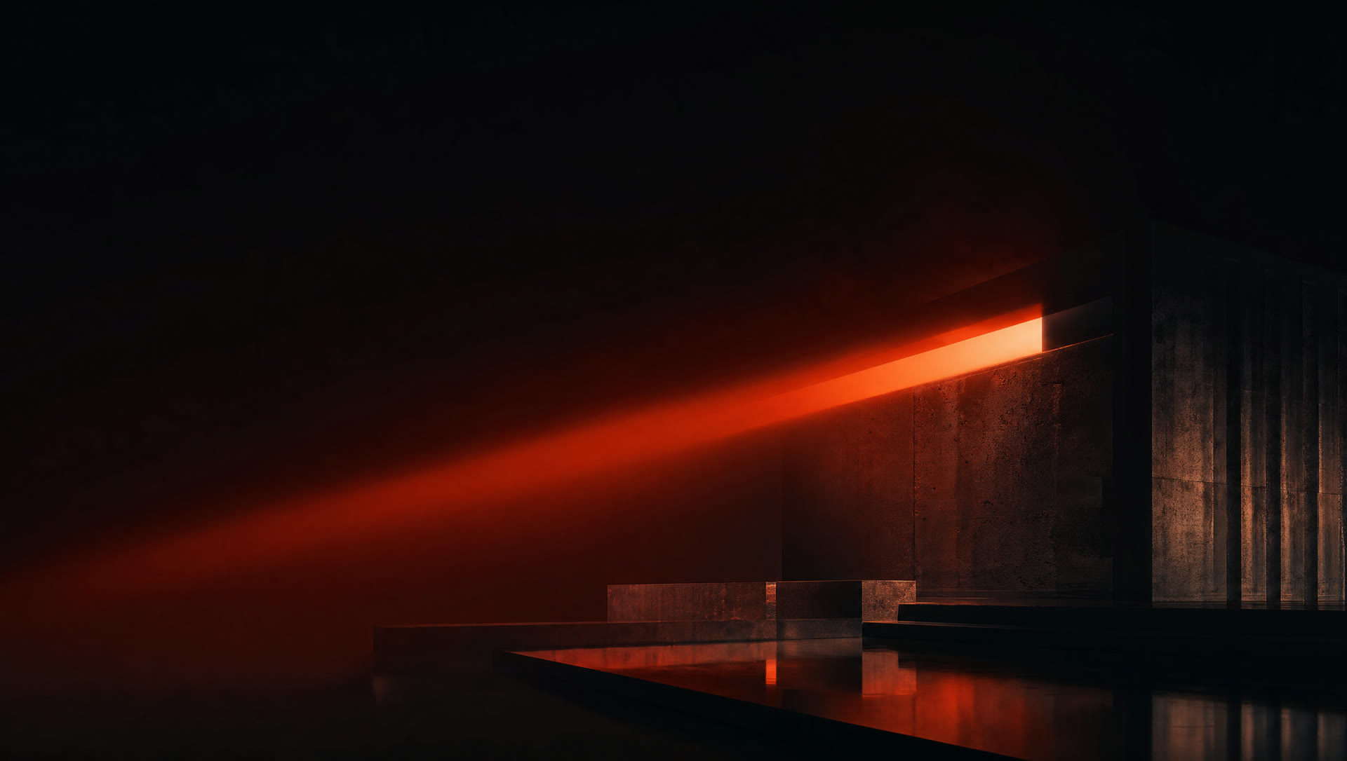 Dark architecture lit by a red-orange beam